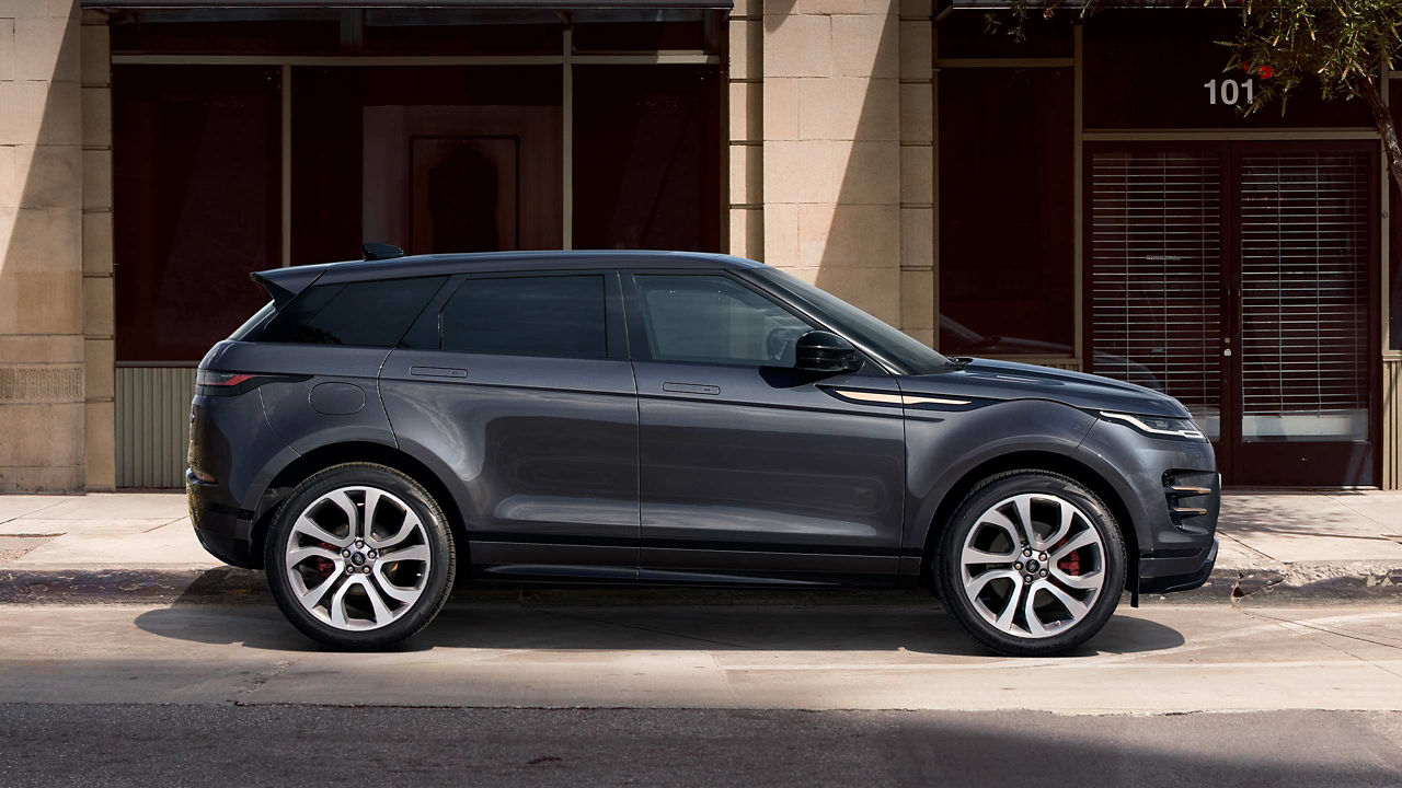 The Range Rover Evoque parked in front of a building