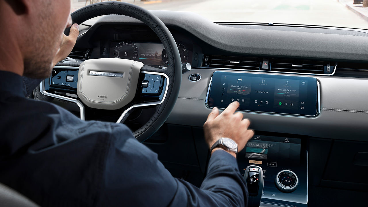 Man Inside Car Using Touch Screen Interface