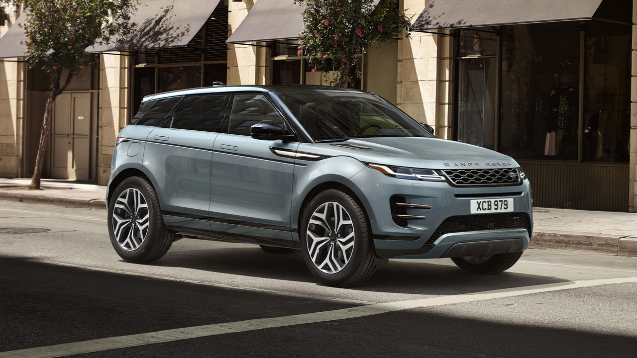 Evoque Parked In Front Of Building