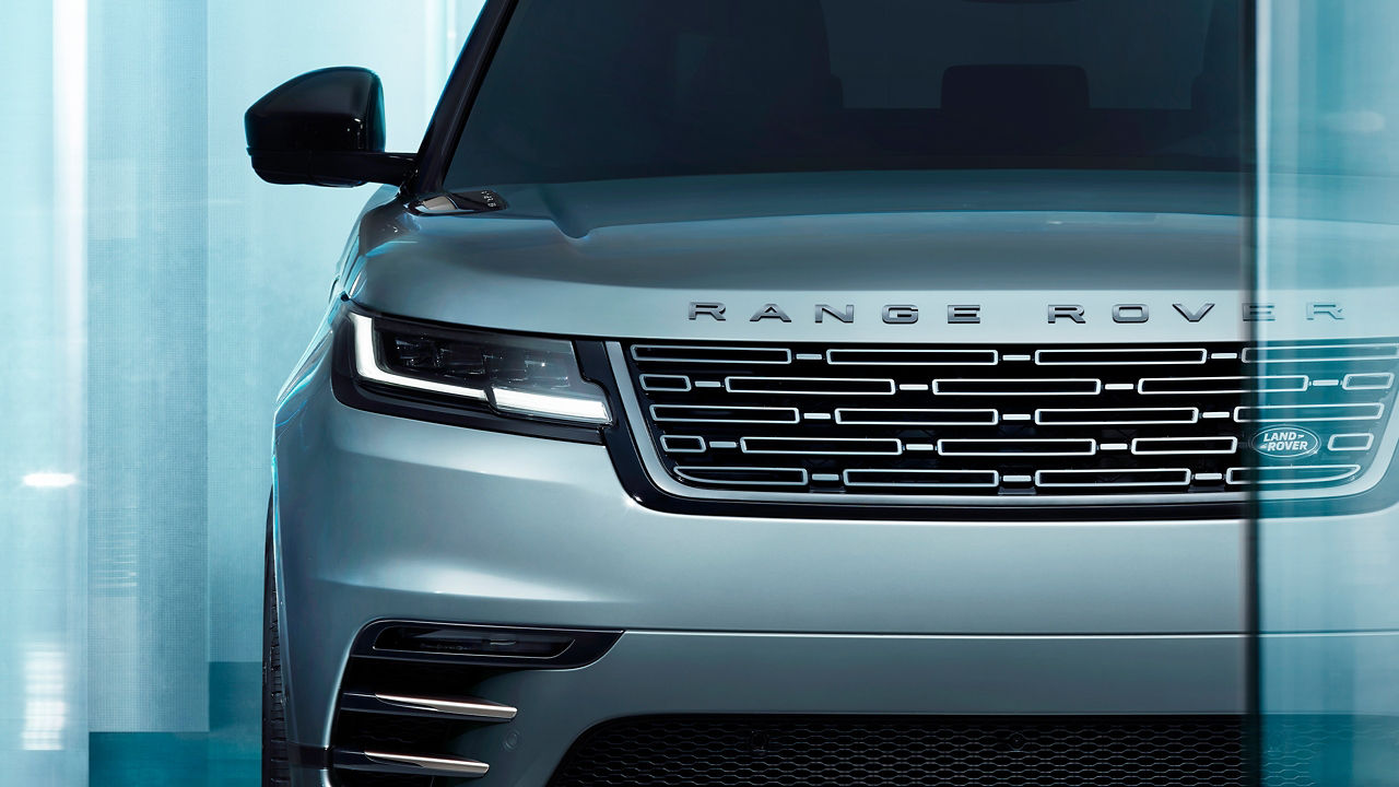  2025 Land Rover Range Rover Velar refined grille and headlights. 