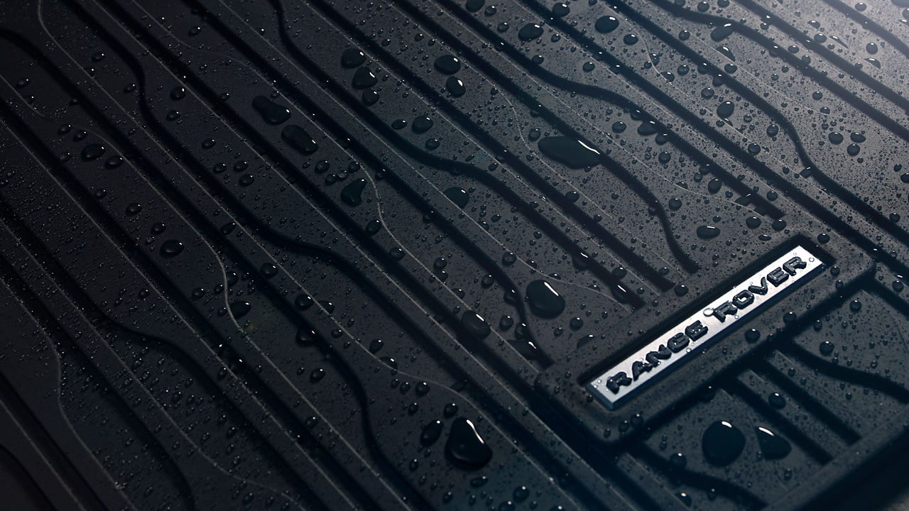 Range rover design logo with water drops