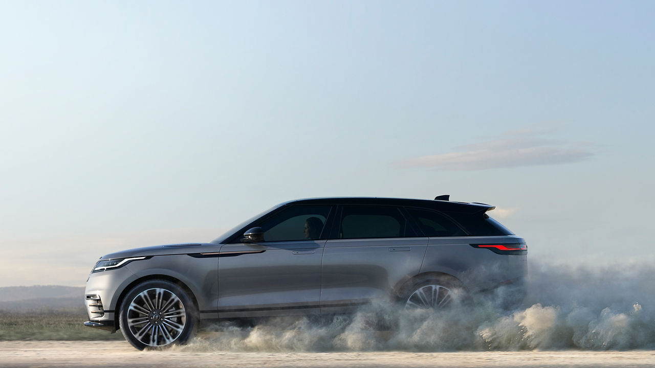 Range Rover Velar running on mountain road