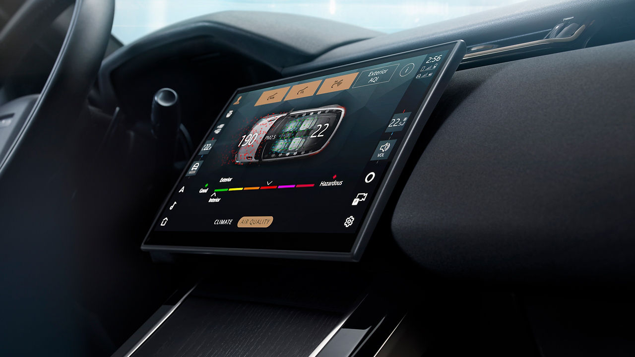  2025 Land Rover Range Rover Velar 11.4-inch floating curved glass Pivi Pro interface. 