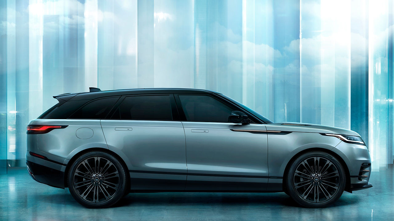 Range Rover Velar side view parked in studio 