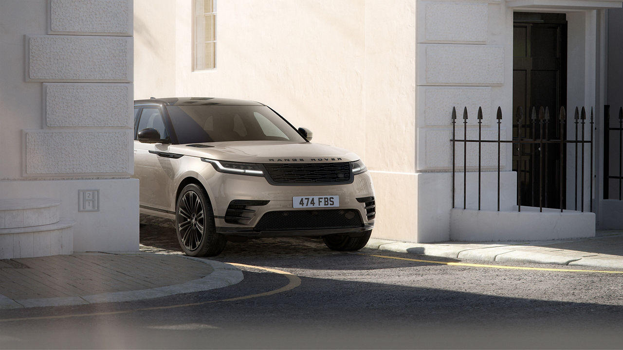 Range Rover Velllar driving on road