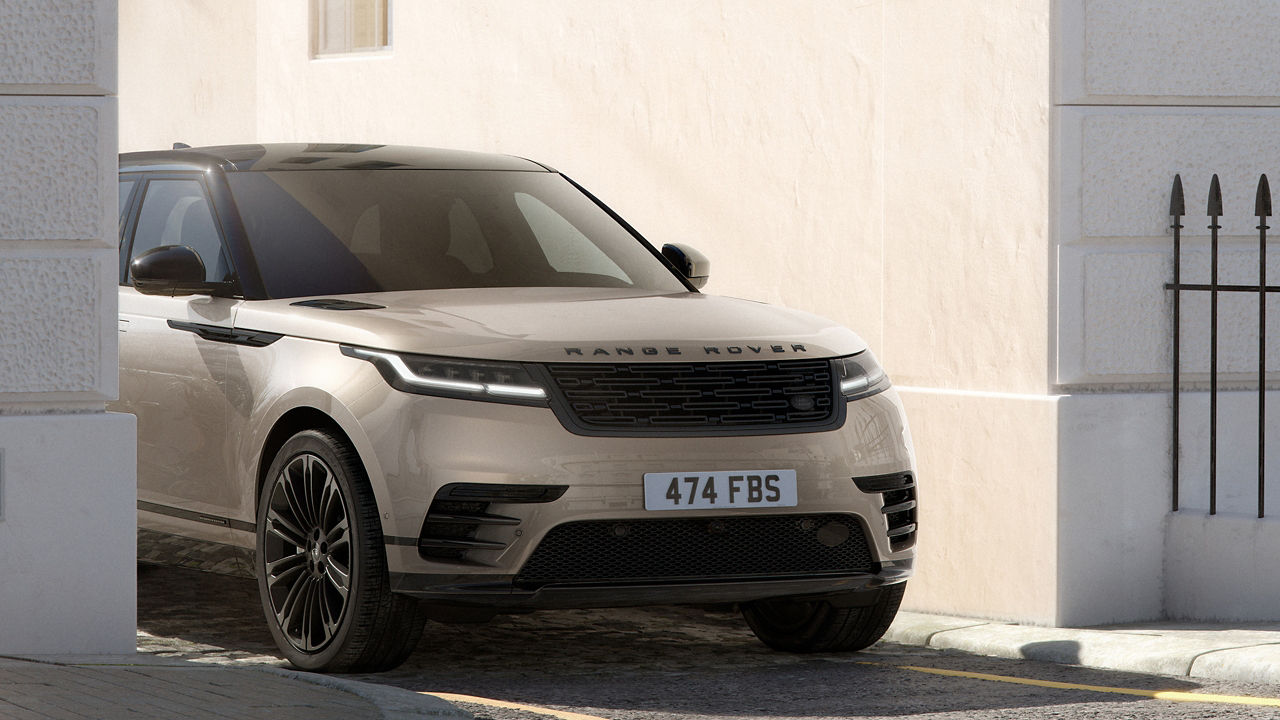 Range Rover Velllar driving on road