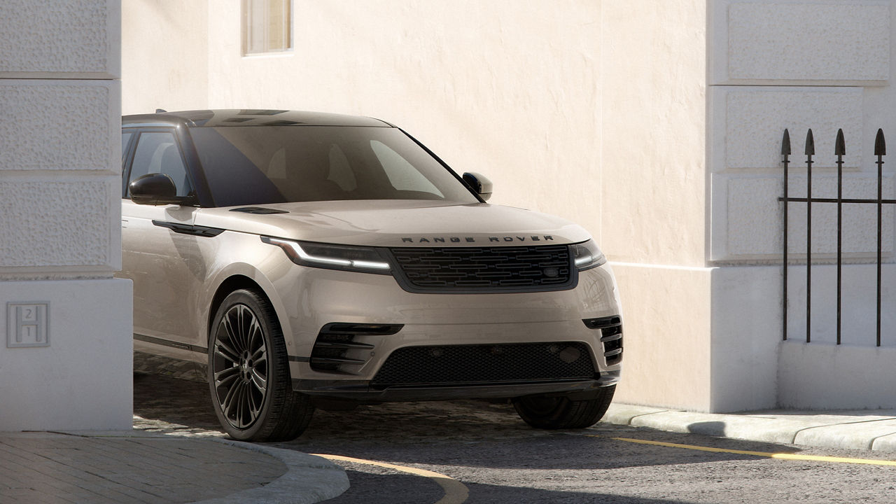 Range Rover Velllar driving on road