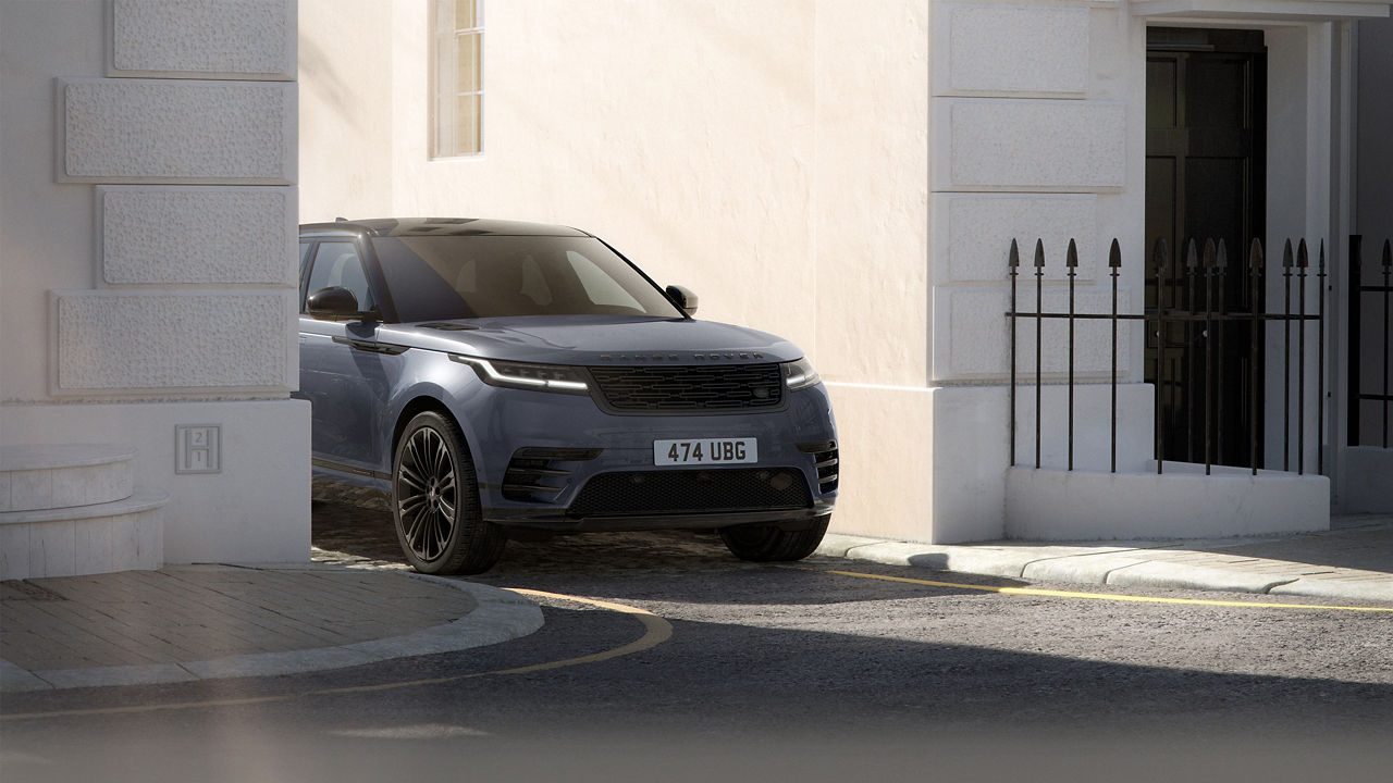 Range Rover Velar belgravia black driving on road