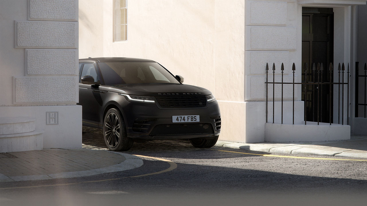 Range Rover Velar belgravia satin driving on road