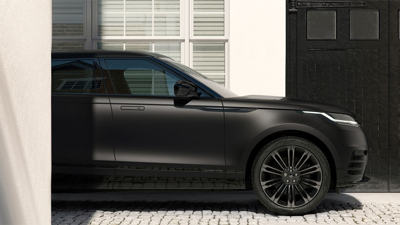 Range Rover Velar belgravia satin driving on road