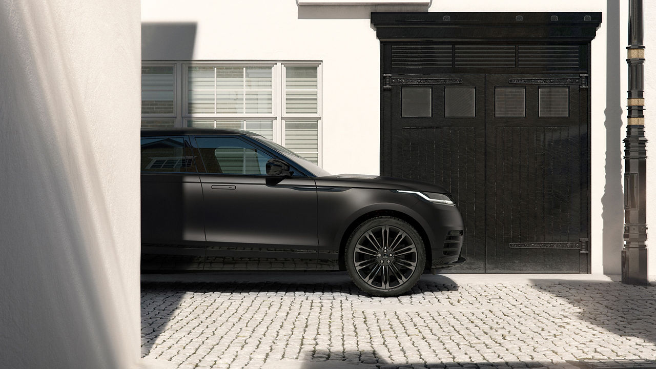 Range Rover Velar belgravia satin driving on road
