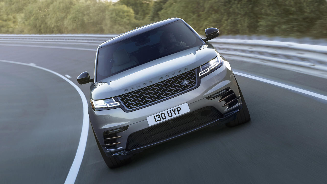 Range Rover Velar going around a banked turn