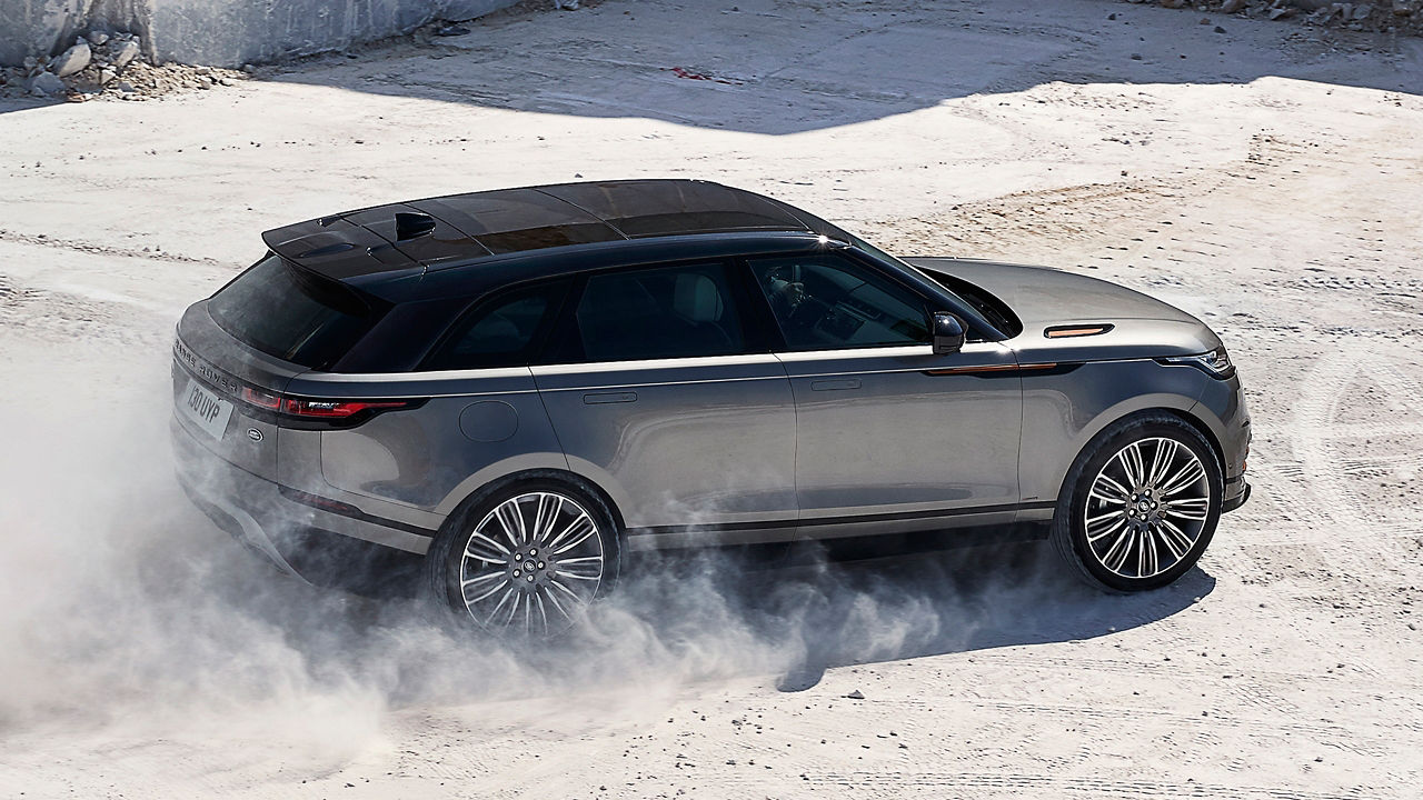 Range Rover Velar Drifting through Sand.