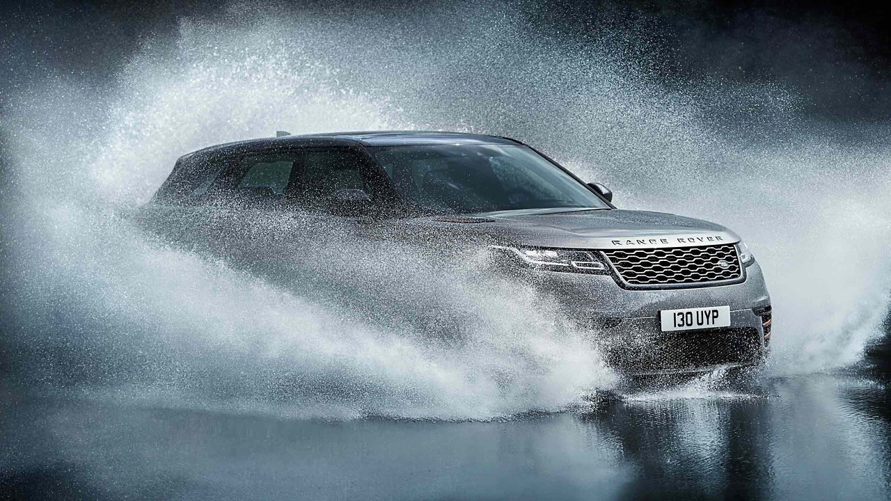 Range Rover Velar driving through water