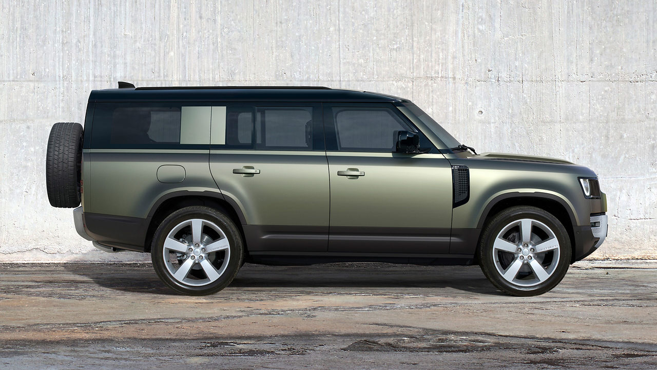 Side view of Defender 130 with Black Roof