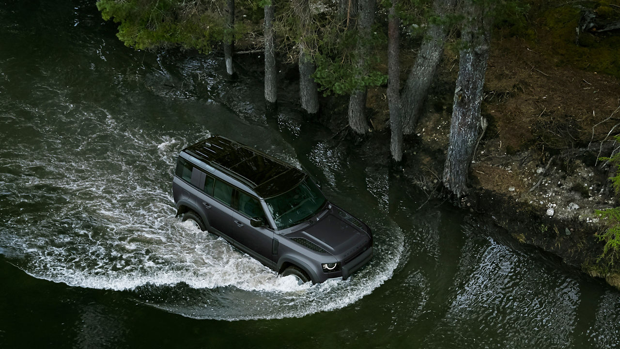 Defender sailing in water