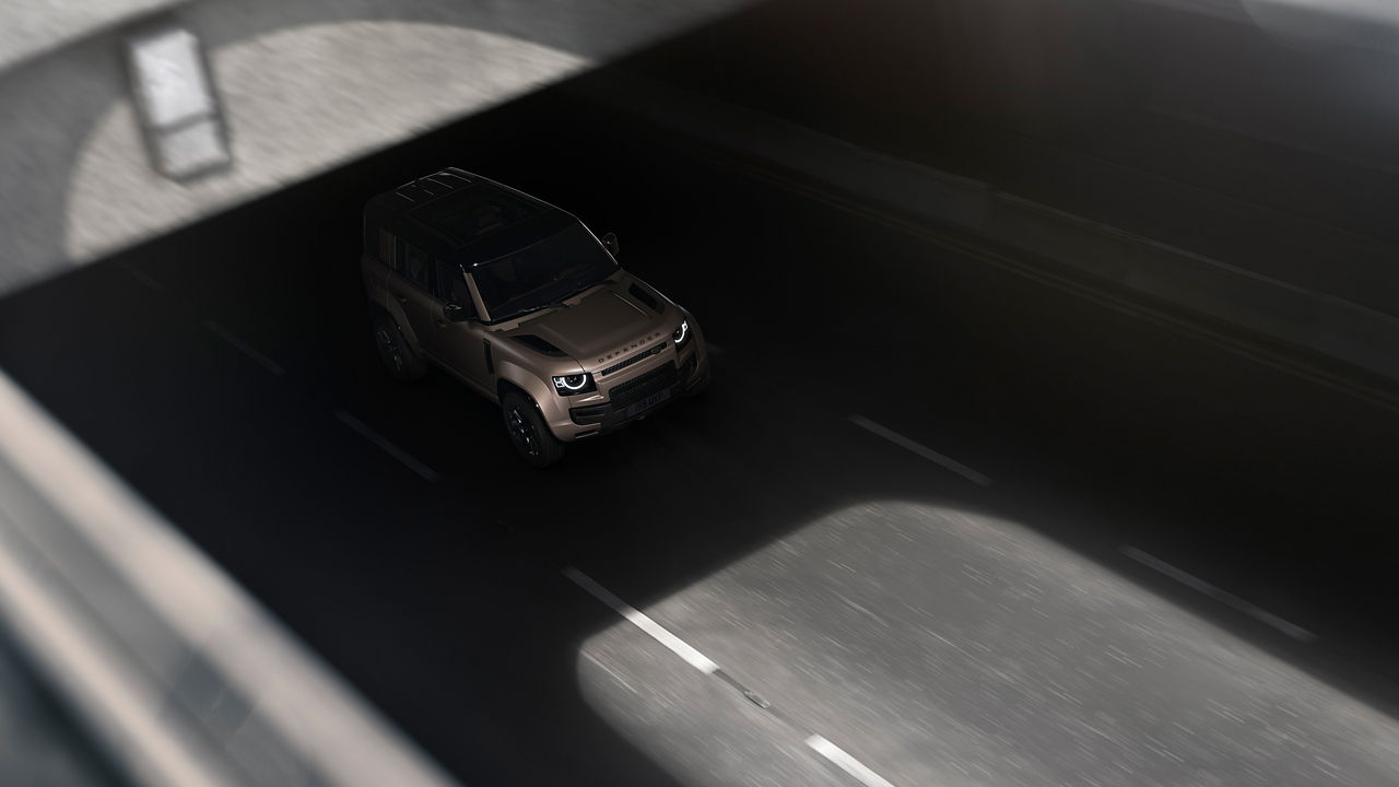 2025 Land Rover Defender Octa driving through underpass