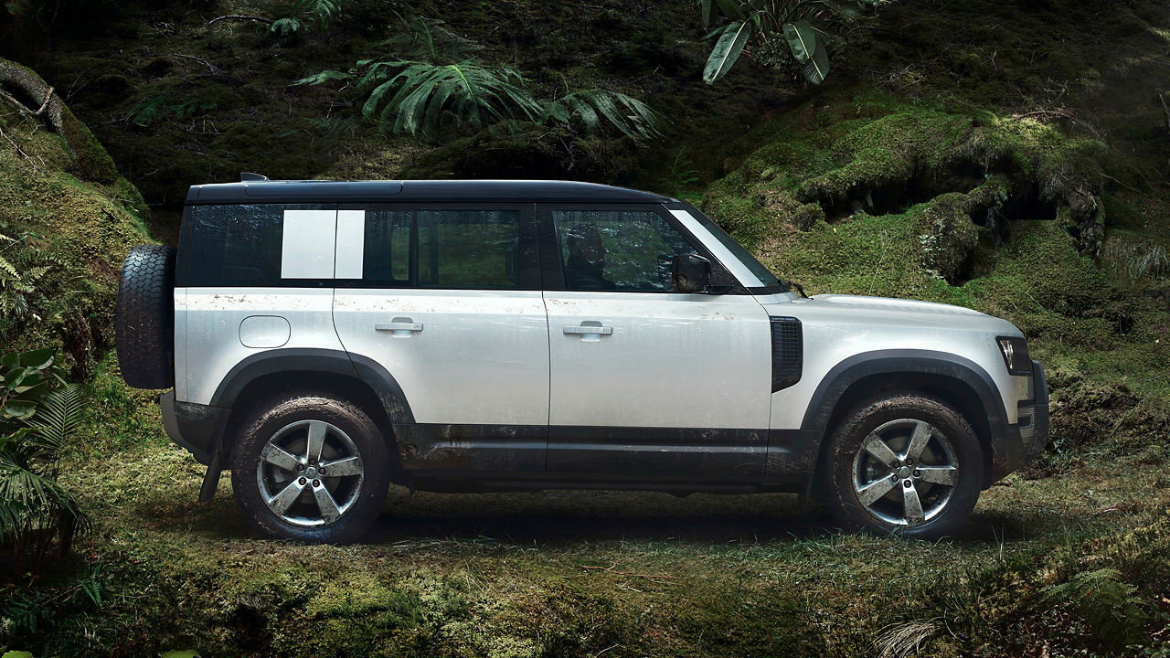 Defender Parked In The Forest