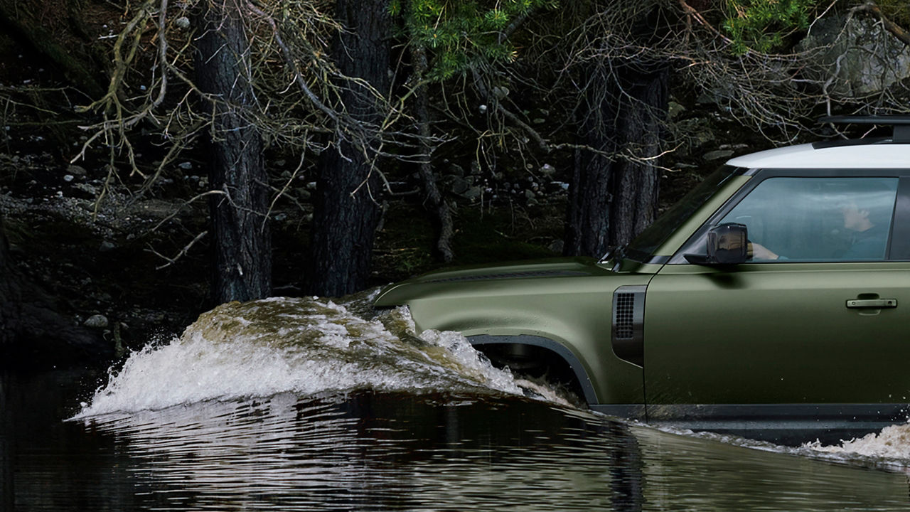 Defender sailing in water