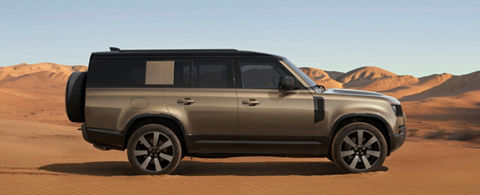 Defender driving in the desert
