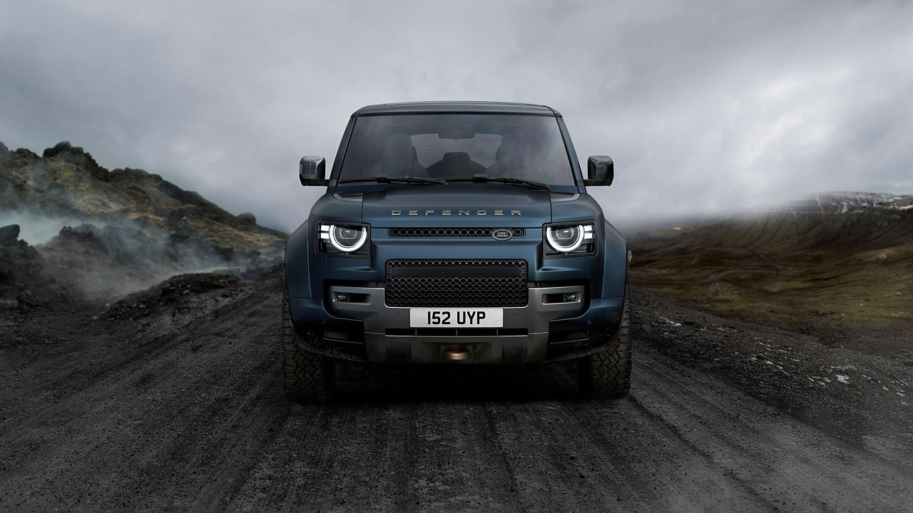 Defender is off roading in the mud