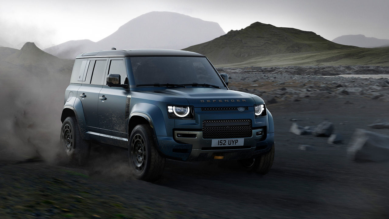Defender drifiting on mountain road
