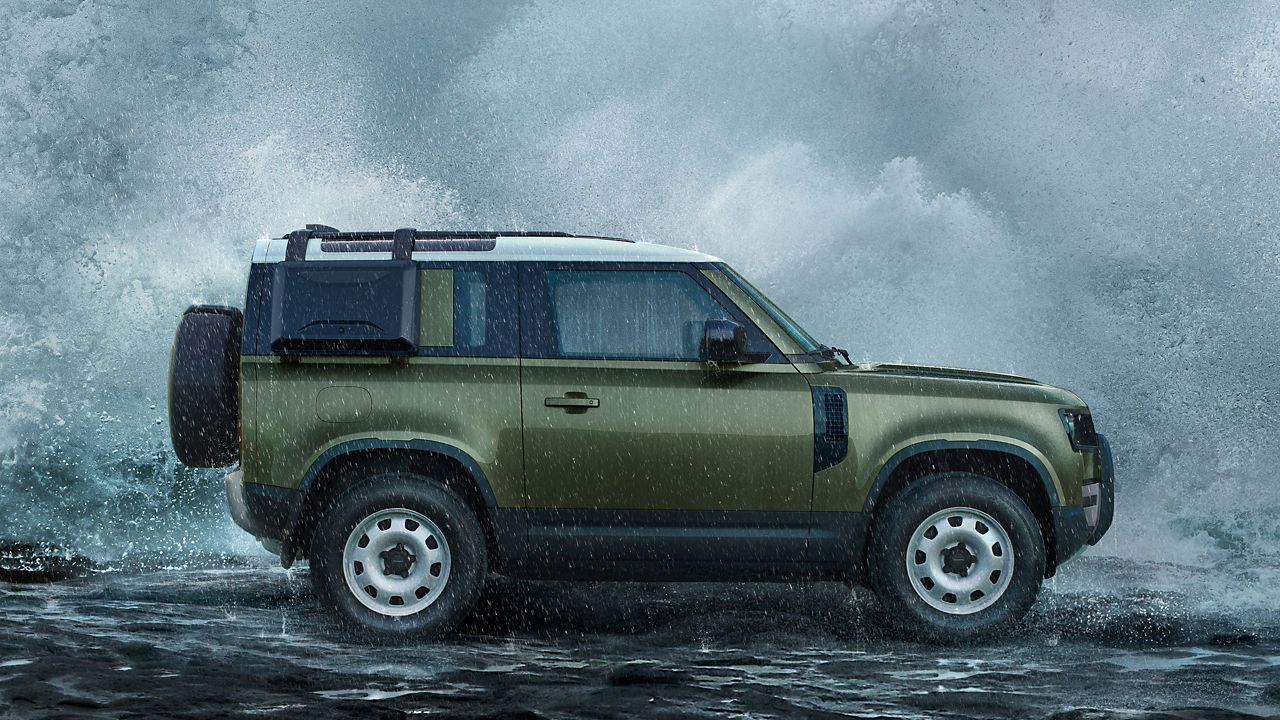 Defender driving in the Rain
