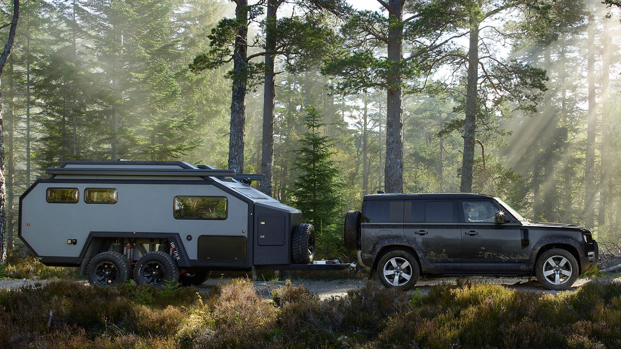 Defender Pulling a towing van