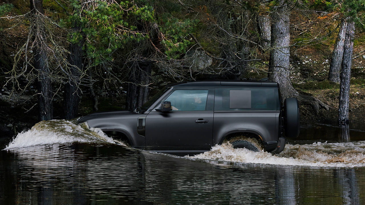 Defender sailing in water