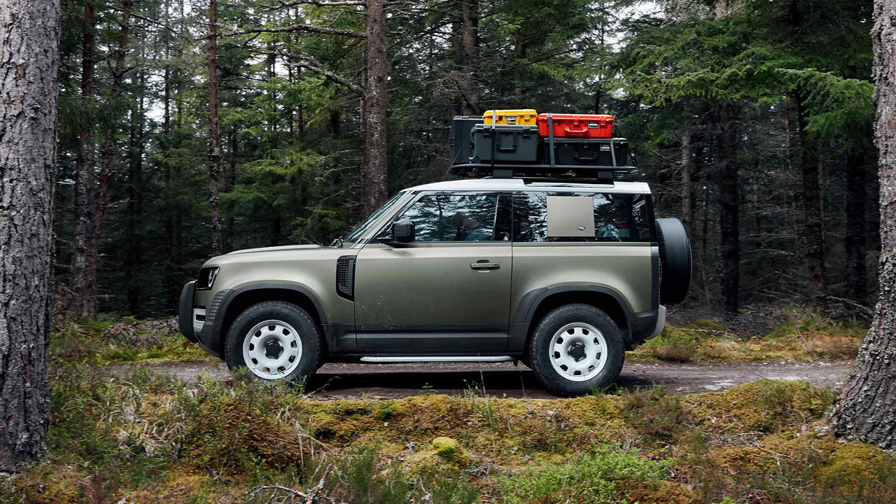 Range Rover Defender 90 in woods