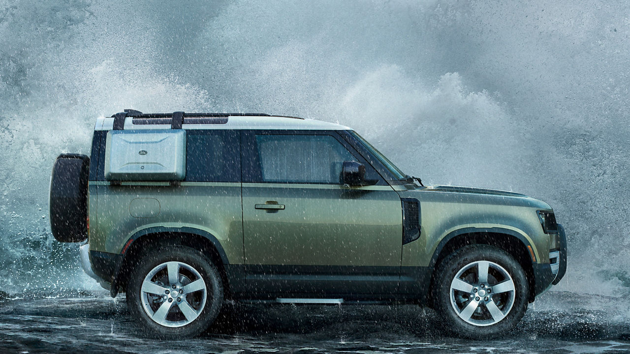 Range Rover Defender in green side view