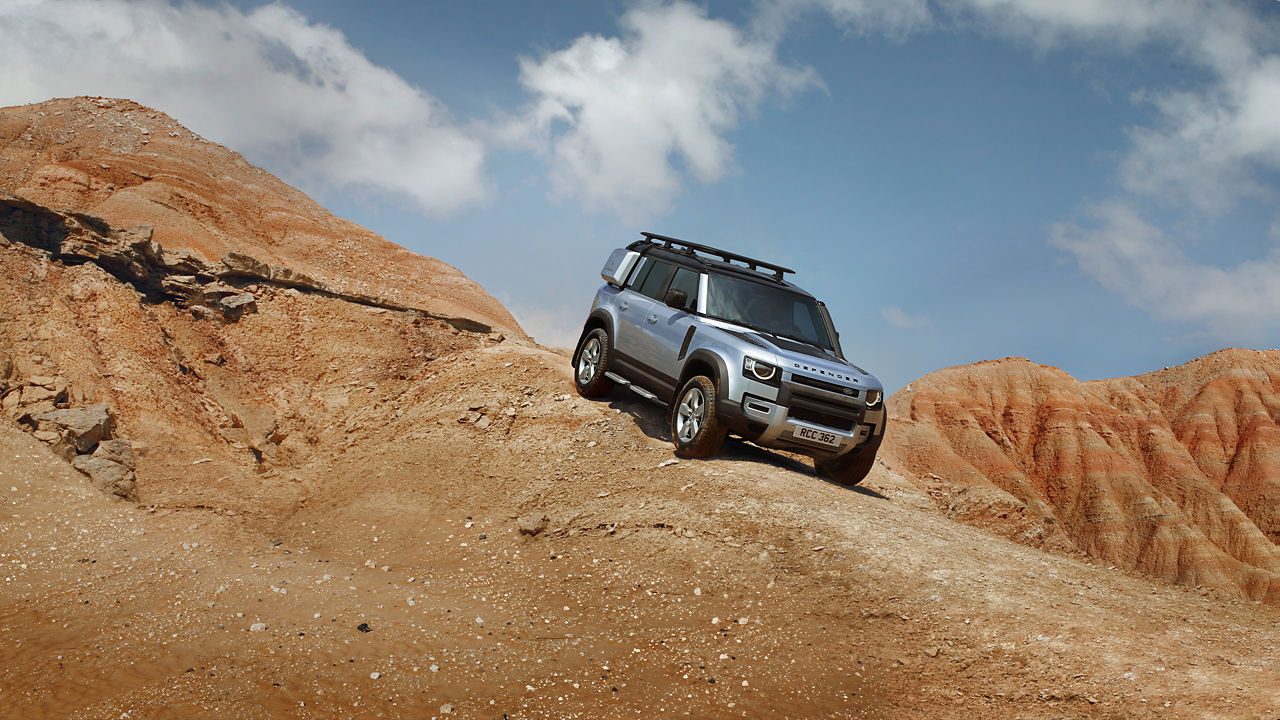 Defender Down Climbing On Mountain Runway Road