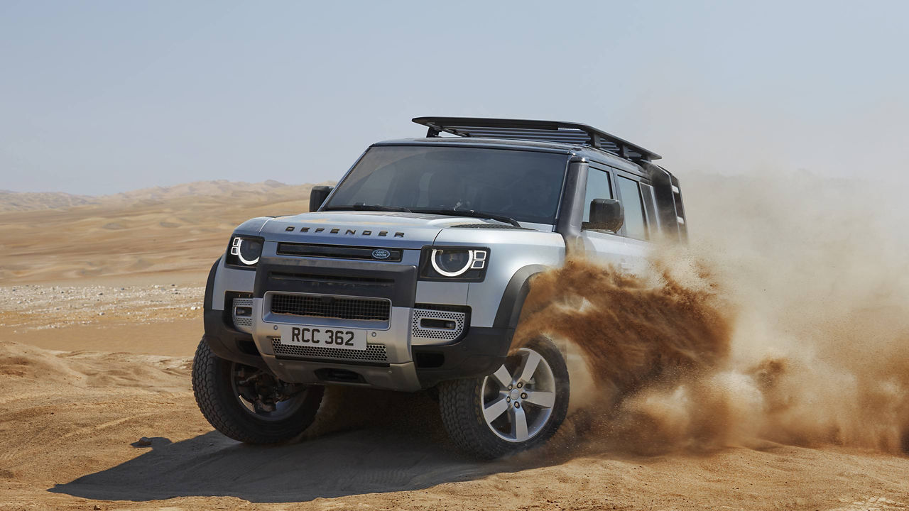 Defender driving in dessert