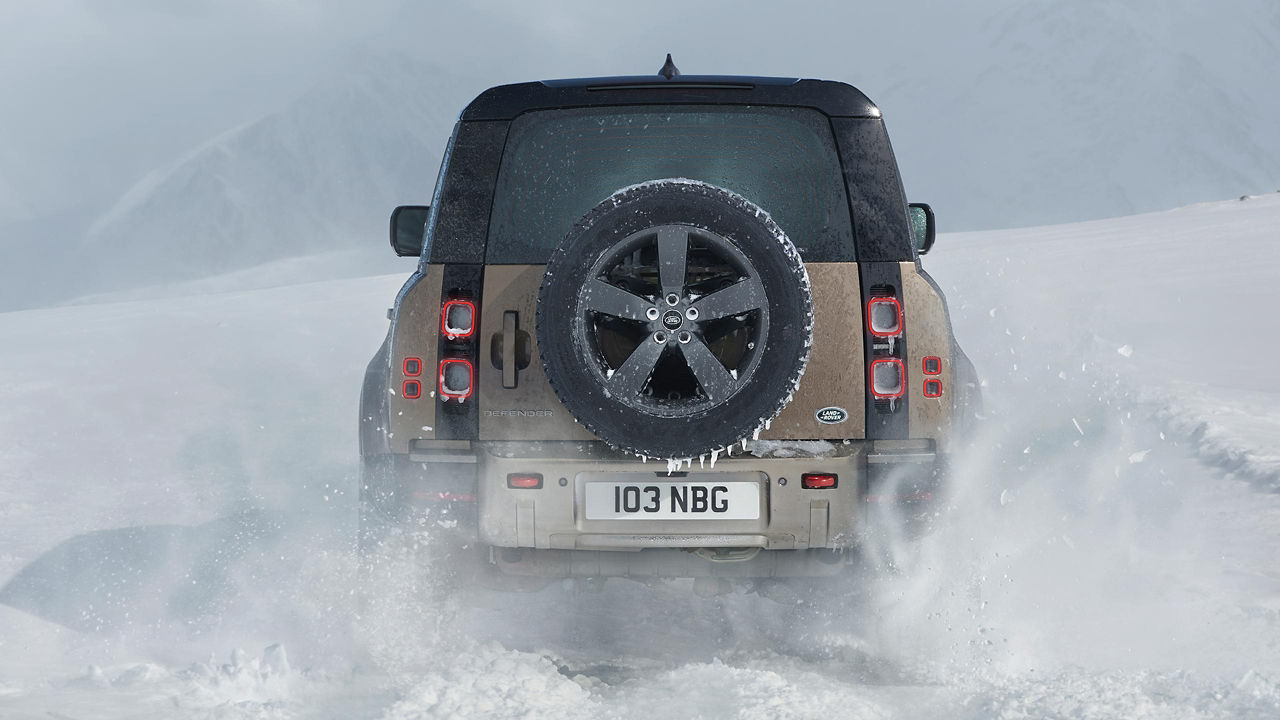 Range Rover Defender Driving through ice 