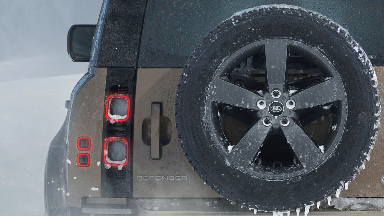 Land Rover Defender back view of extra tyre