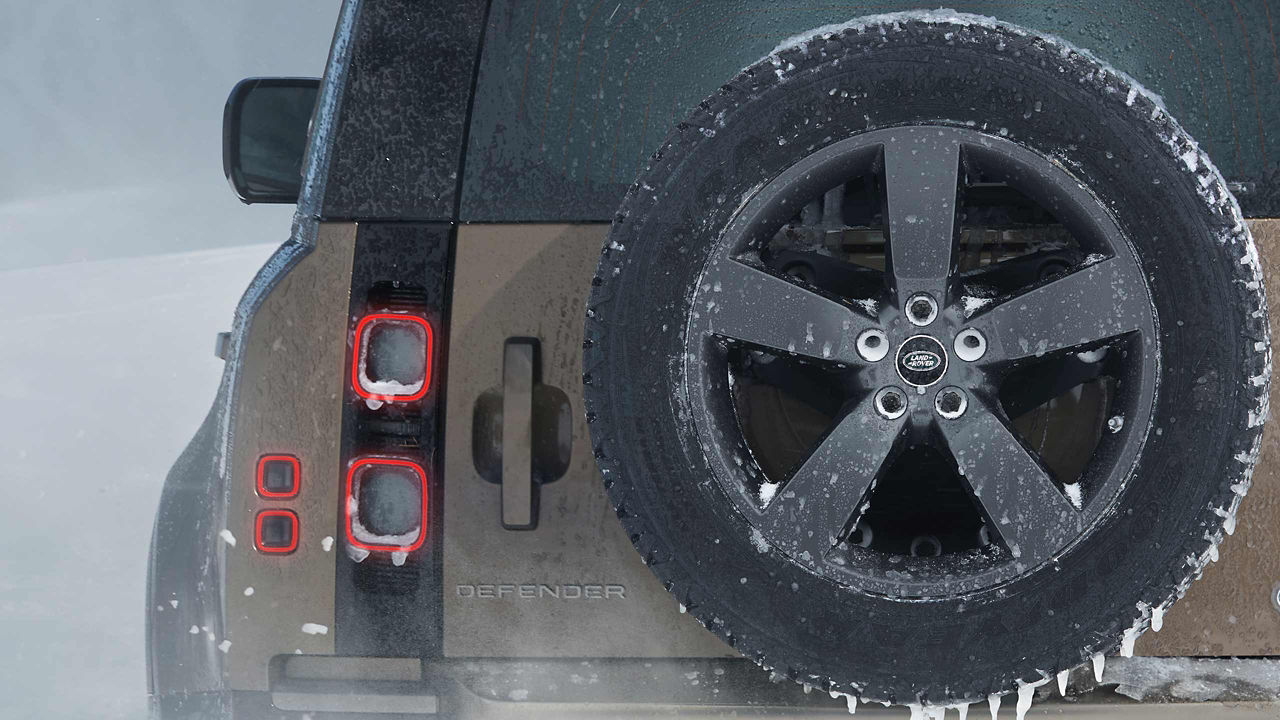 Land Rover Defender back view of extra tyre