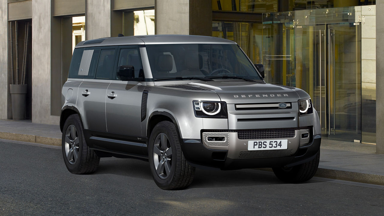 Defender Parked In Front Of Shop