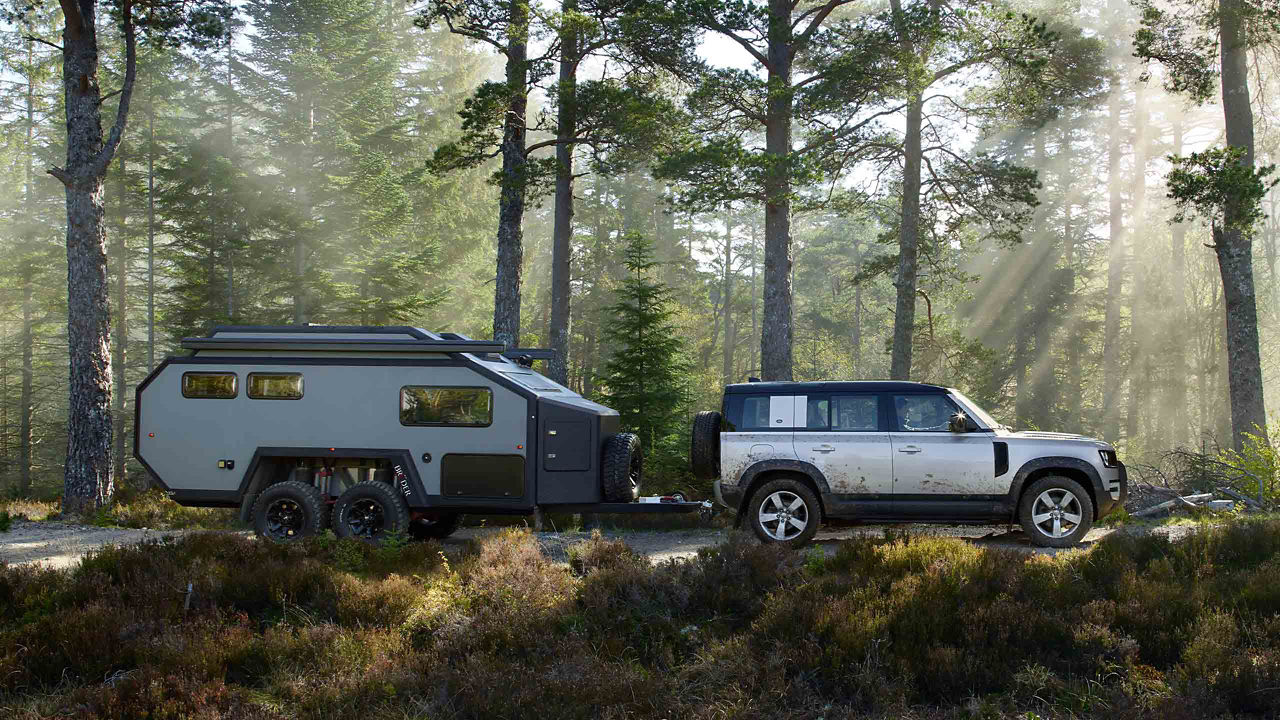 Range Rover 110 in woods 