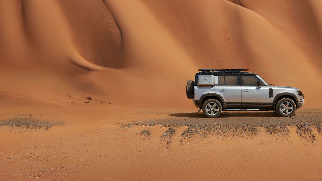 Defender standing on Sand Road