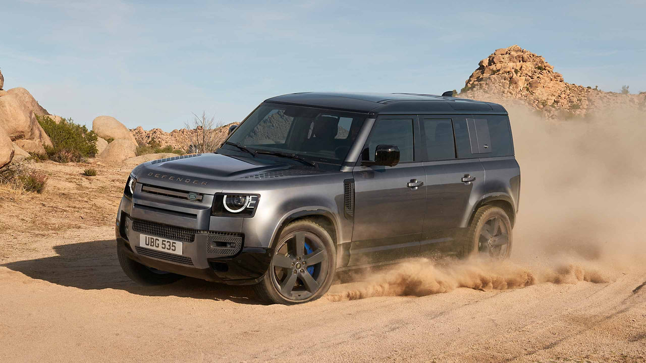 Range Rover Defender driving in the desert