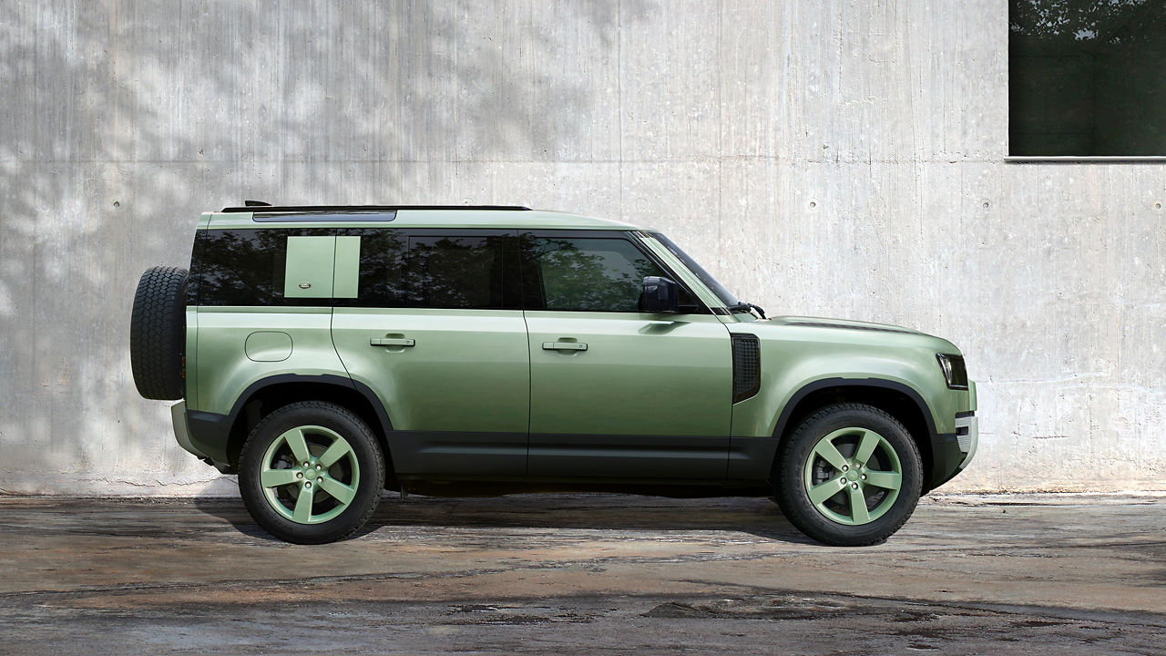 The vehicle rides on a set of 20-inch alloy wheels in Grasmere Green