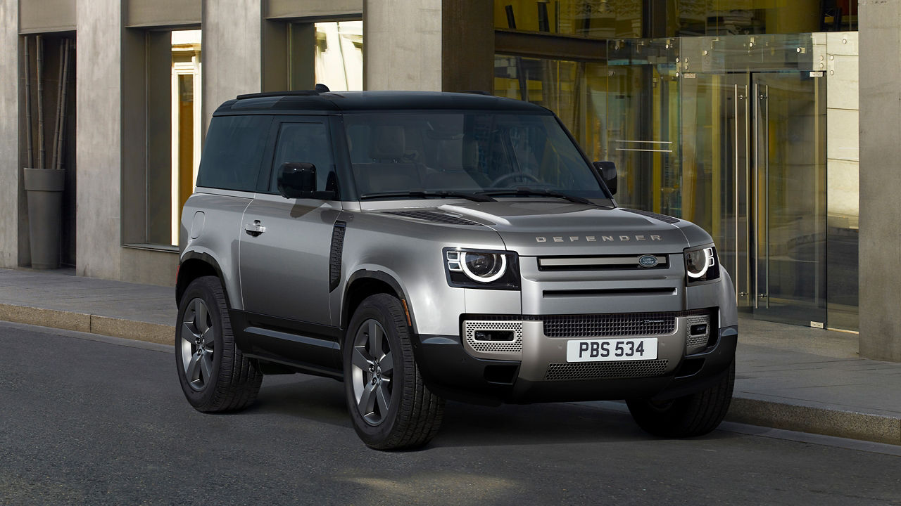 Defender Parked In Front Of Building