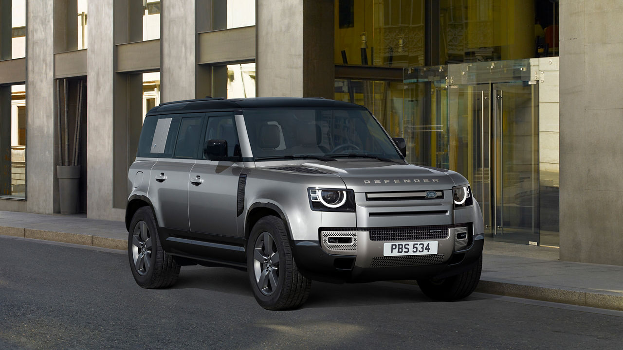 Defender Parked In Front Of Building