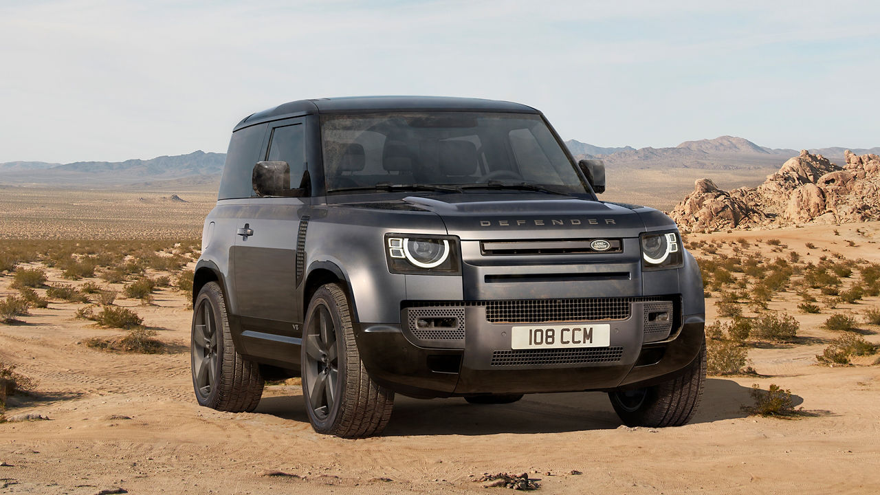 Defender standing on mountain road