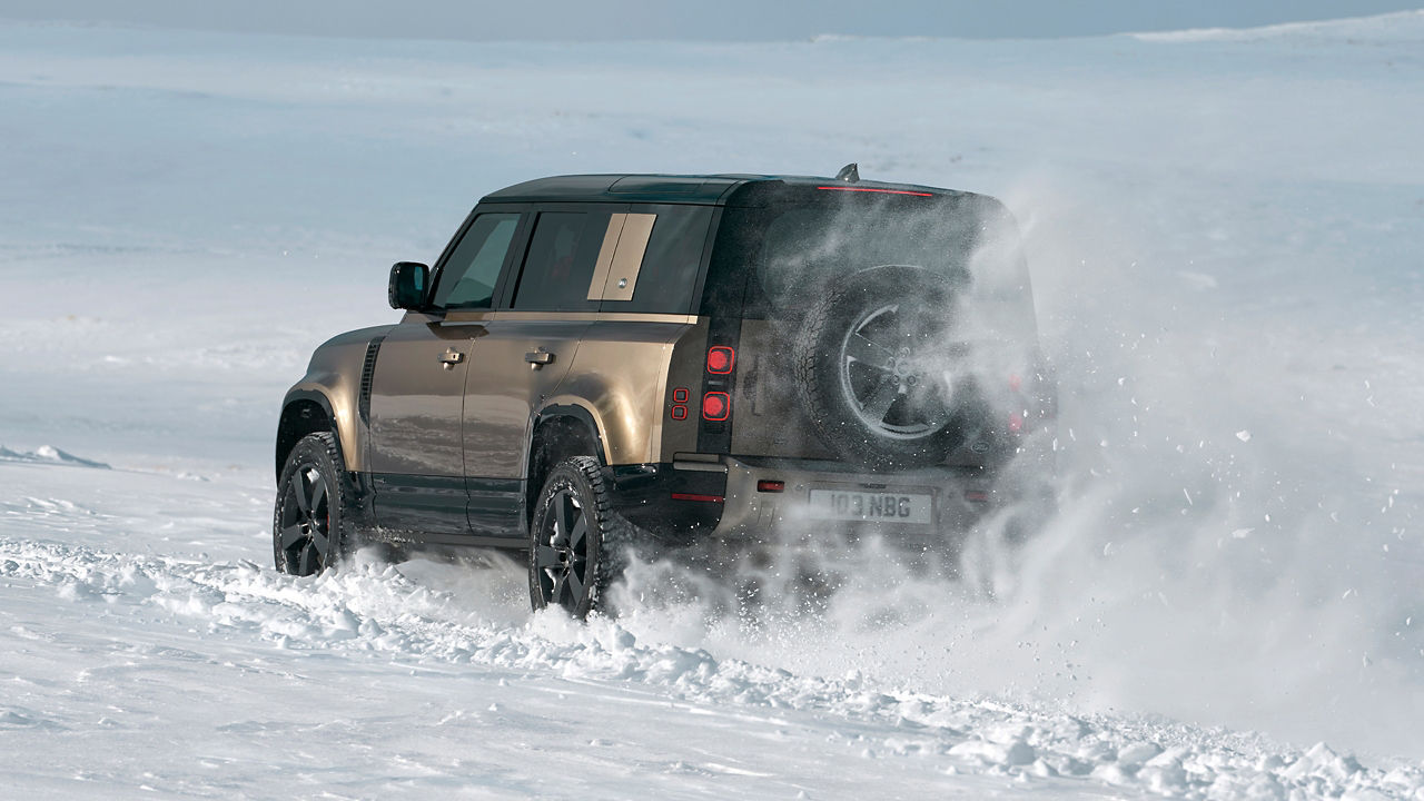 Defender Drifting Over Ice Highway Road