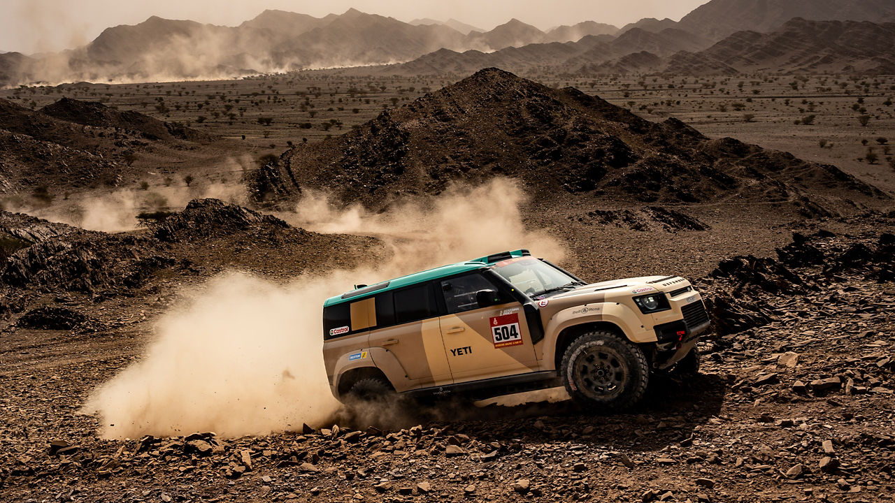 DEFENDER Dakar off-roading on rocky hil