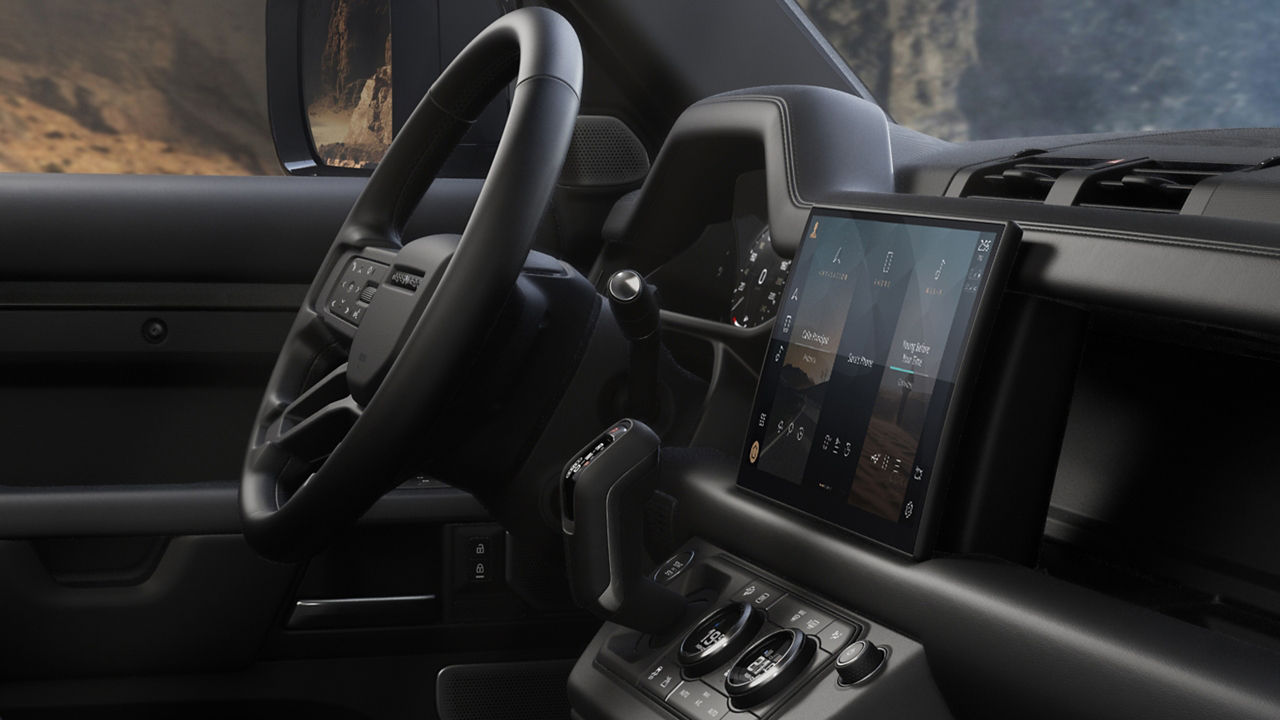 Interior of the driver seat from a Defender with Infotainment touch screen display
