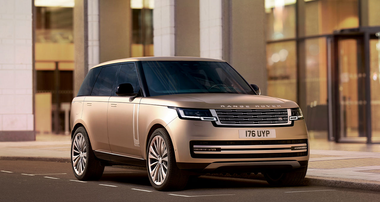 Side view of Range Rover on a street