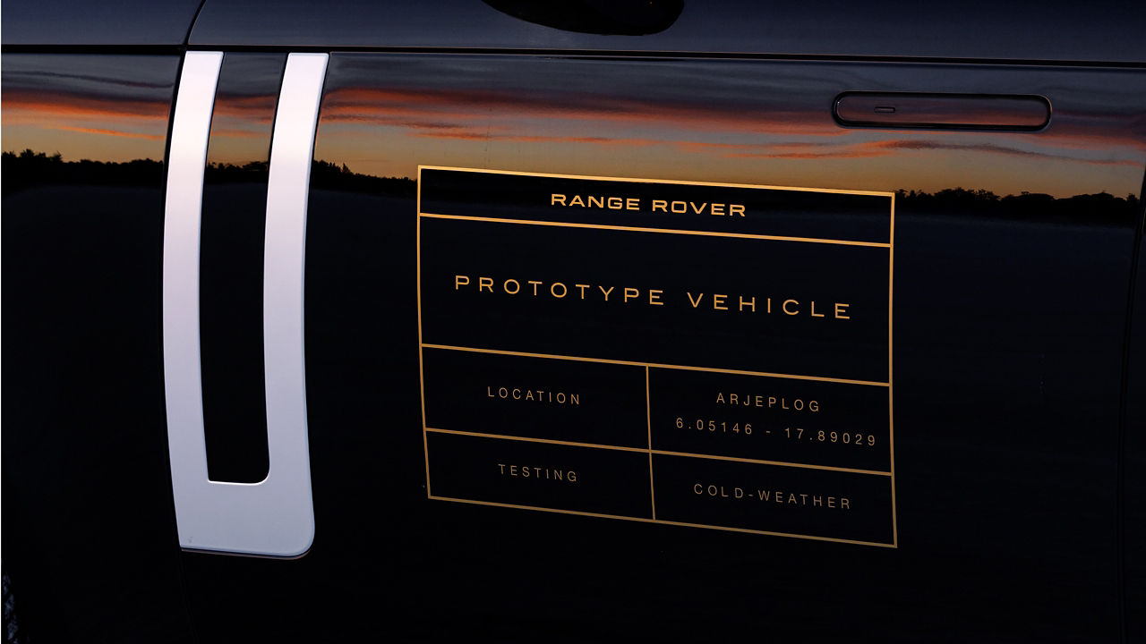 Range Rover Electric Prototype Vehicle label on side of Range Rover vehicle.