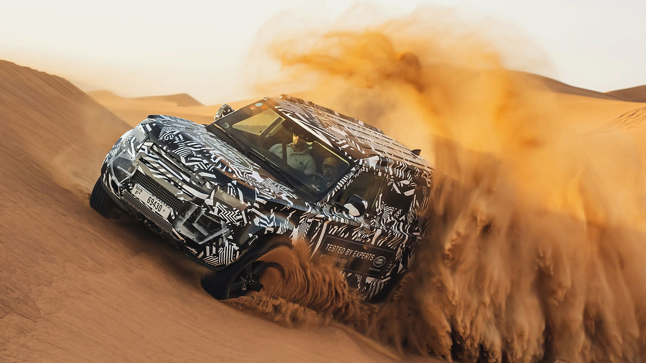 Land Rover Defender testing on a Desert Road